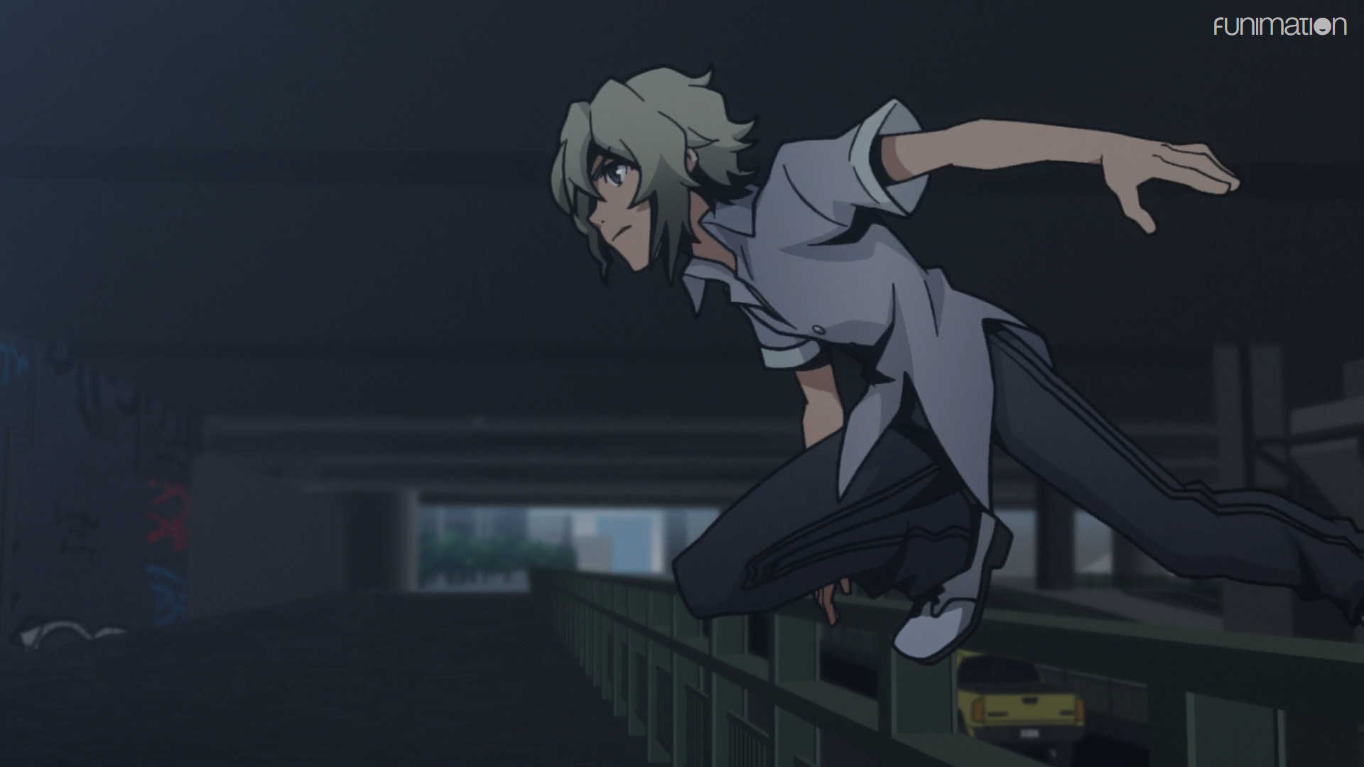 Screenshot of Joshua from The World Ends With You Anime, crouched down on a guardrail.